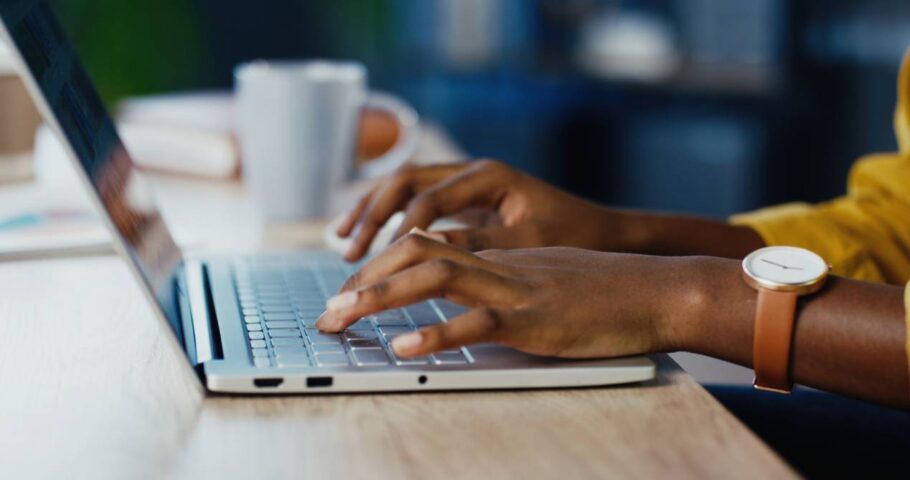 person typing on computer